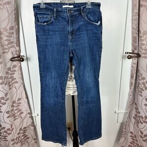 Levi’s 515 darker Wash mid rise blue jeans with pockets